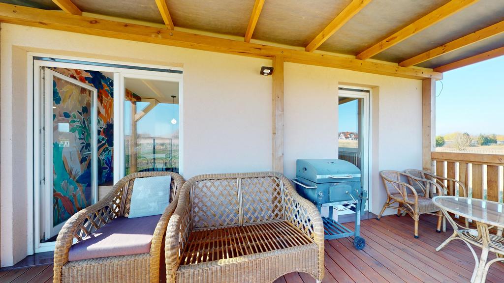 Dom na sprzedaż Rewal 69 m2 | Arka Nieruchomości